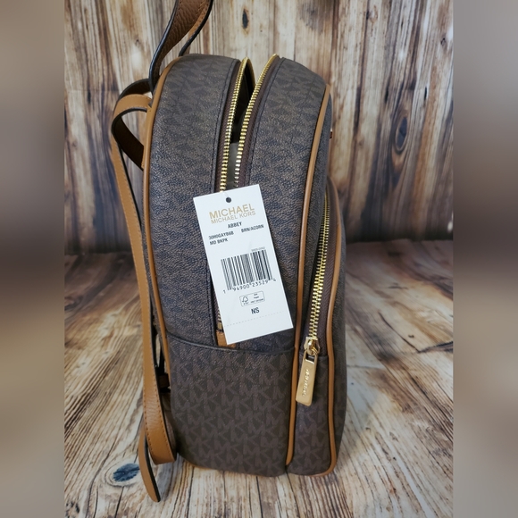 abbey medium logo and leather backpack Michael Kors Women's Studded Black 35T8GAYB2L Elevate your style with the Adina Medium PVC Leather Convertible Backpack from Michael Kors Michael Kors Abbey Medium Quilted